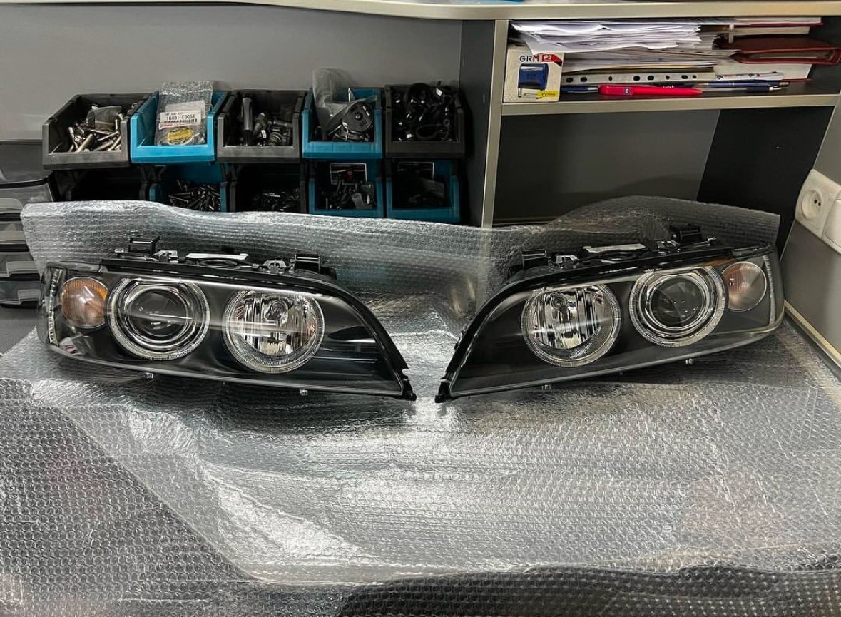 New Original Xenon Headlights HELLA BMW E39
